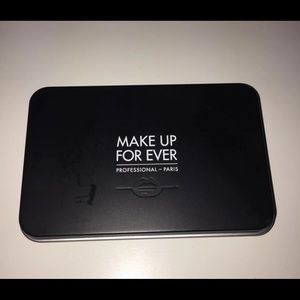 Make Up For Ever Matte Blurring Powder Foundation.